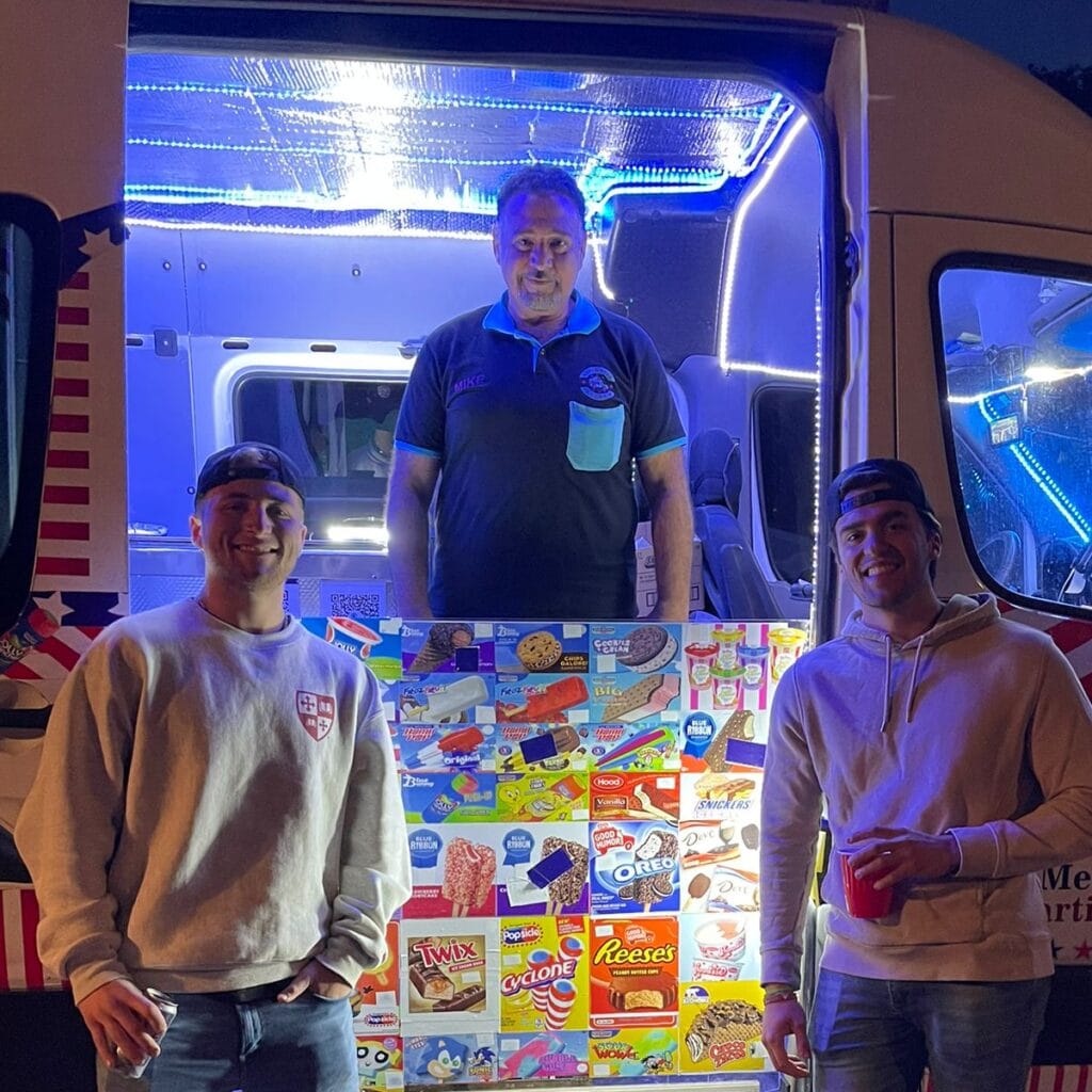 Graduation celebration with ice cream truck serving students and families