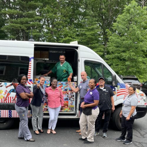 Ice cream truck serving guests at a Boston block party or birthday event in Boston MA