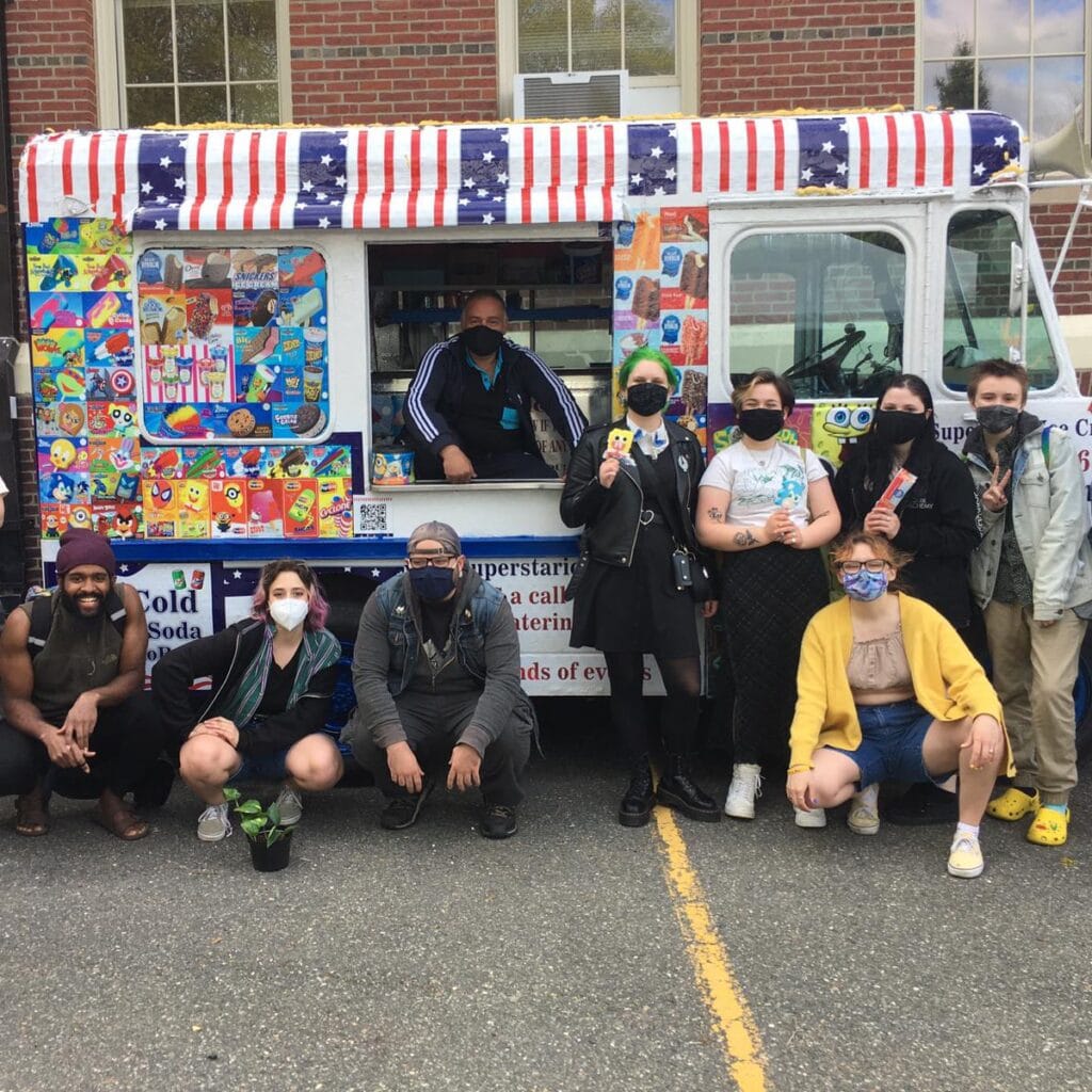 Ice cream truck serving employees at a company appreciation event