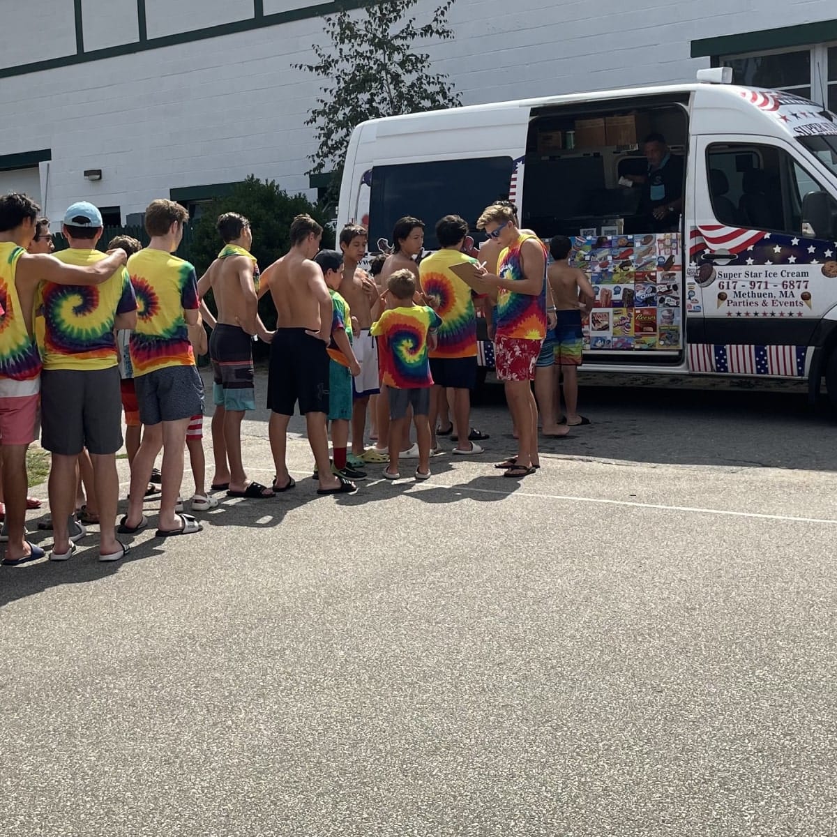 Ice cream truck serving guests at a birthday party and Kids Birthday Ice Cream Truck Needham MA