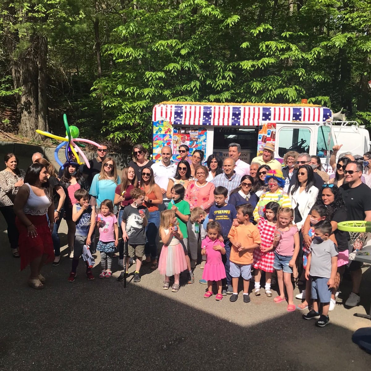 Ice cream truck serving guests at a Sudbury community event