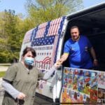 Colorful ice cream truck parked at a party