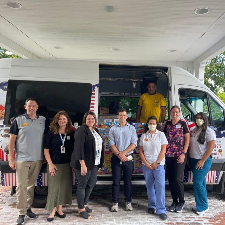 Colorful ice cream truck from SUPER STAR ICE CREAM at a birthday party in Concord MA