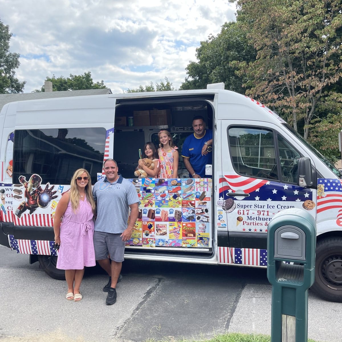 Colorful ice cream truck serving guests at an outdoor event in Milton, MA