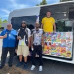 Colorful ice cream truck parked at outdoor event in Massachusetts