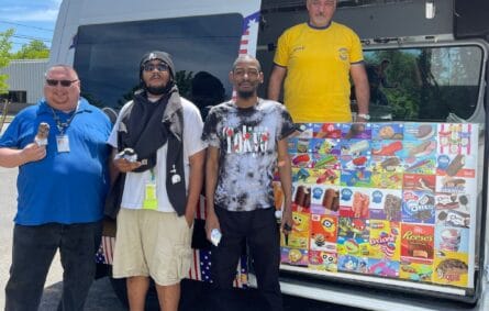 Colorful ice cream truck parked at outdoor event in Massachusetts