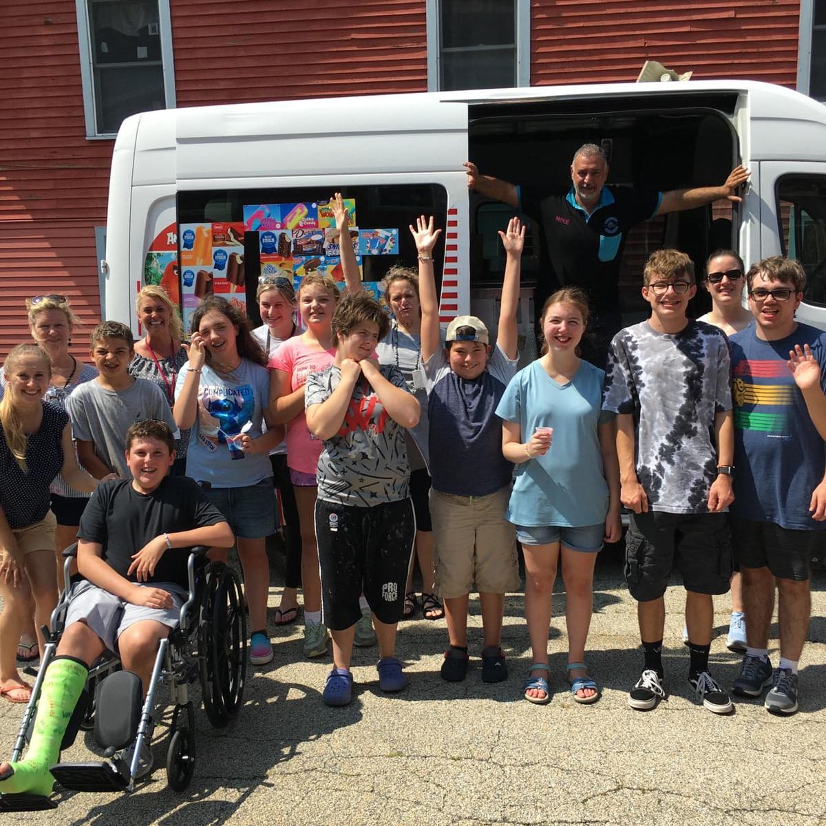 Ice cream truck serving guests at an East Boston event and Ice Cream Truck Rental Newton MA