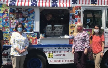 Ice cream truck at a graduation event in Reading MA serving graduates