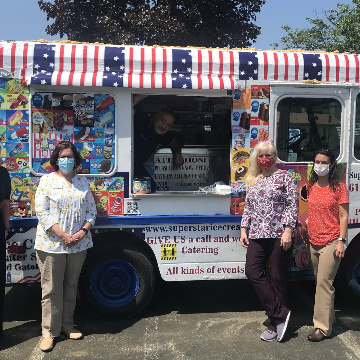Ice cream truck at a graduation event in Reading MA serving graduates