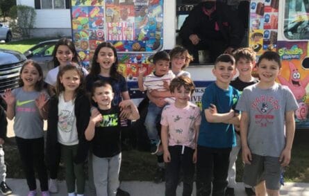 Ice cream truck serving guests at a Lawrence MA event for Ice Cream Truck Rental Lawrence MA