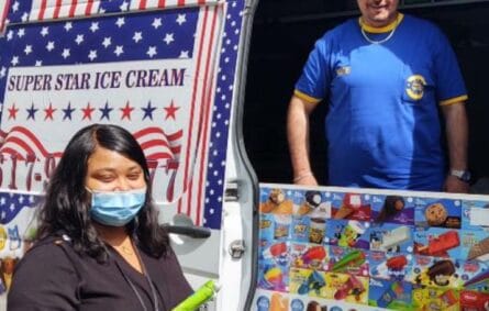 Custom-branded ice cream truck at a marketing event