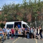 Colorful ice cream truck serving kids at a birthday party in Randolph